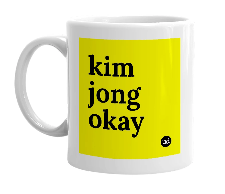 White mug with 'kim jong okay' in bold black letters