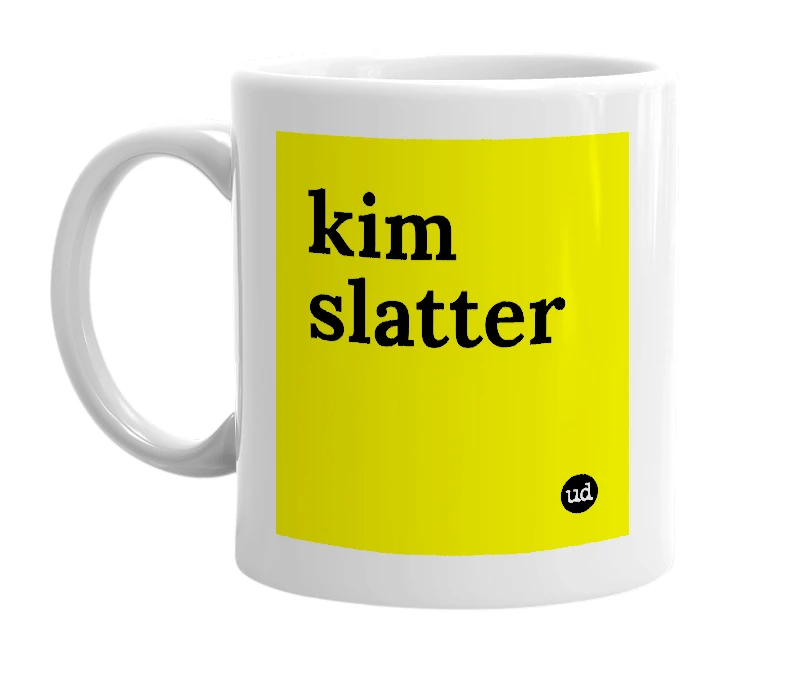 White mug with 'kim slatter' in bold black letters