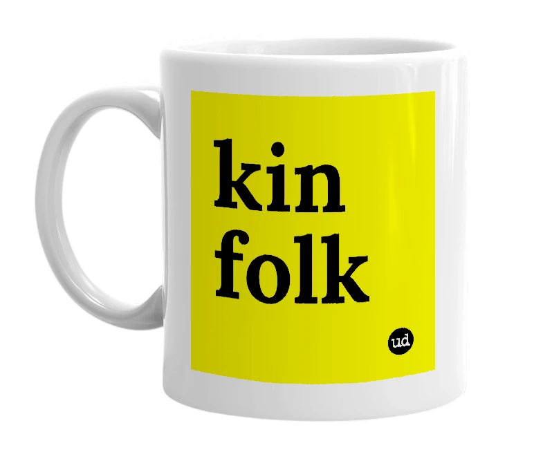 White mug with 'kin folk' in bold black letters