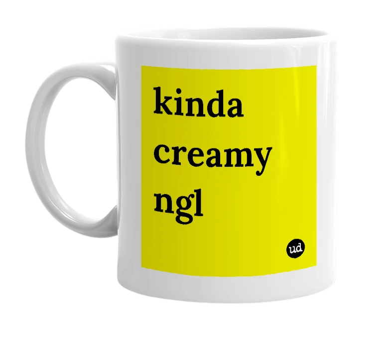 White mug with 'kinda creamy ngl' in bold black letters