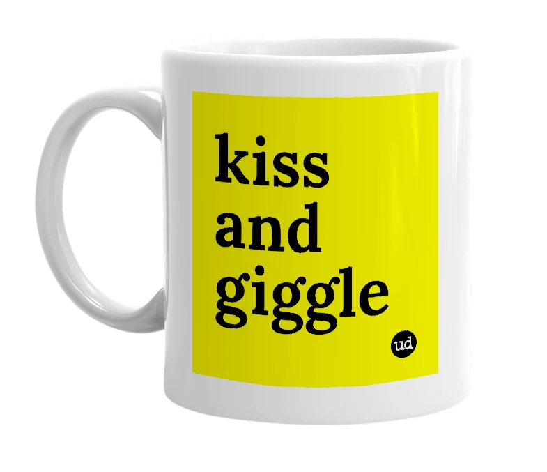 White mug with 'kiss and giggle' in bold black letters