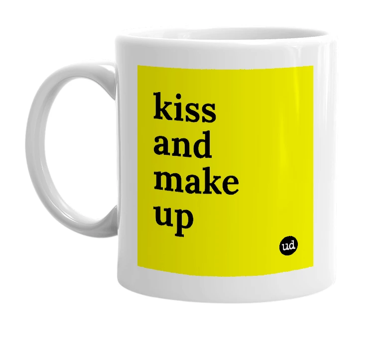 White mug with 'kiss and make up' in bold black letters