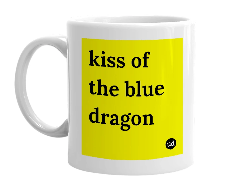 White mug with 'kiss of the blue dragon' in bold black letters