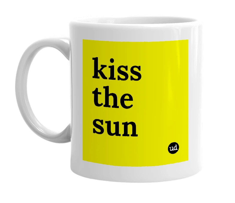 White mug with 'kiss the sun' in bold black letters