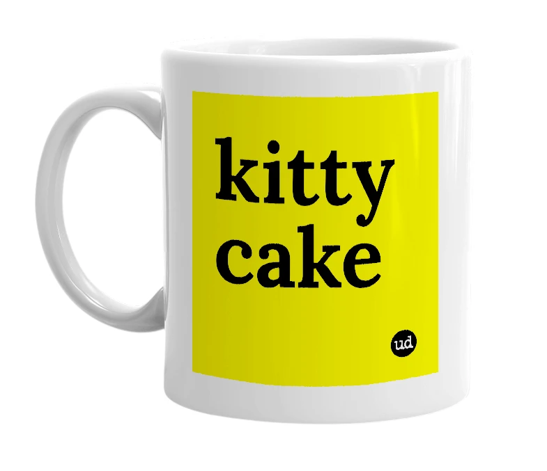 White mug with 'kitty cake' in bold black letters