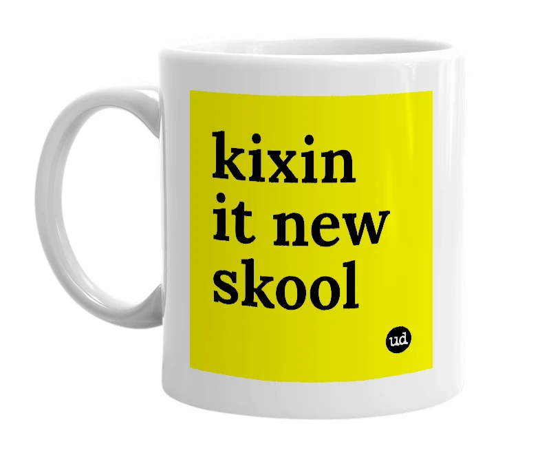 White mug with 'kixin it new skool' in bold black letters
