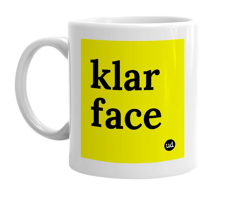 White mug with 'klar face' in bold black letters