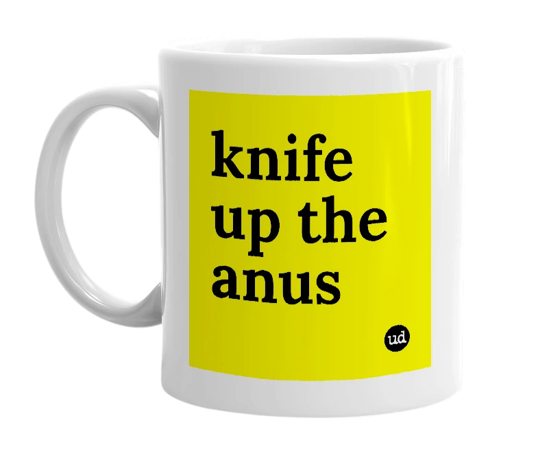 White mug with 'knife up the anus' in bold black letters