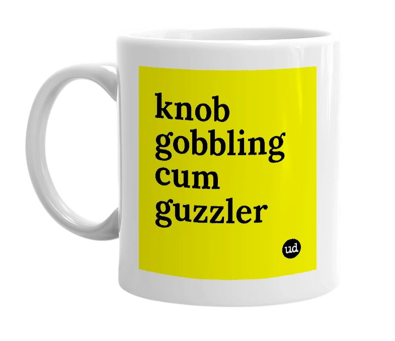 White mug with 'knob gobbling cum guzzler' in bold black letters