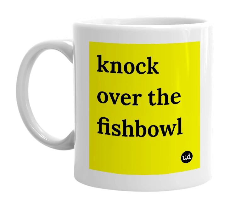 White mug with 'knock over the fishbowl' in bold black letters