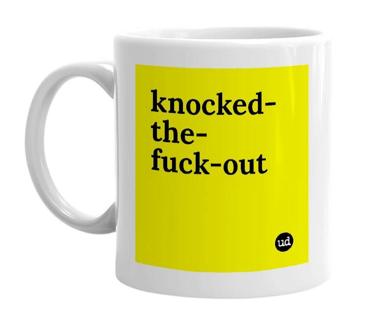 White mug with 'knocked-the-fuck-out' in bold black letters