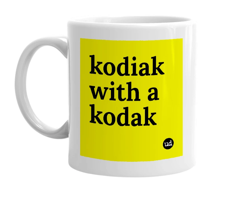 White mug with 'kodiak with a kodak' in bold black letters