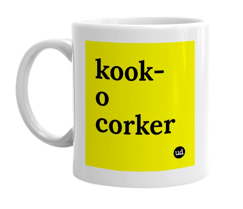 White mug with 'kook-o corker' in bold black letters