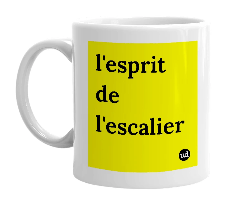 White mug with 'l'esprit de l'escalier' in bold black letters