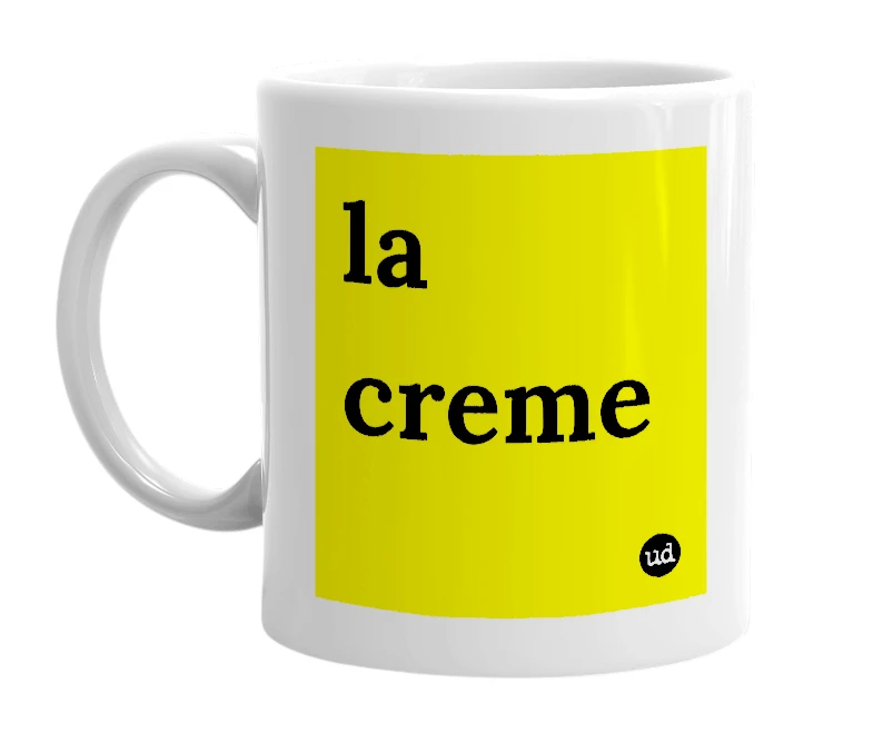 White mug with 'la creme' in bold black letters