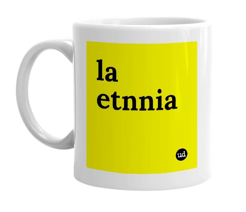 White mug with 'la etnnia' in bold black letters