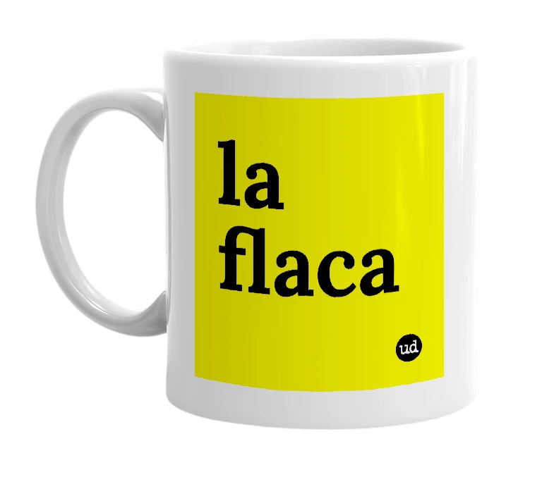 White mug with 'la flaca' in bold black letters