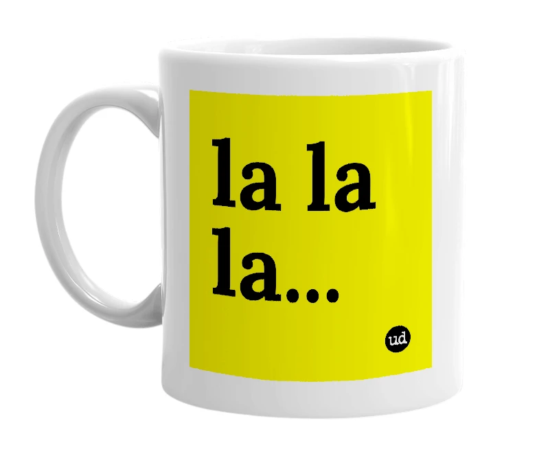 White mug with 'la la la...' in bold black letters