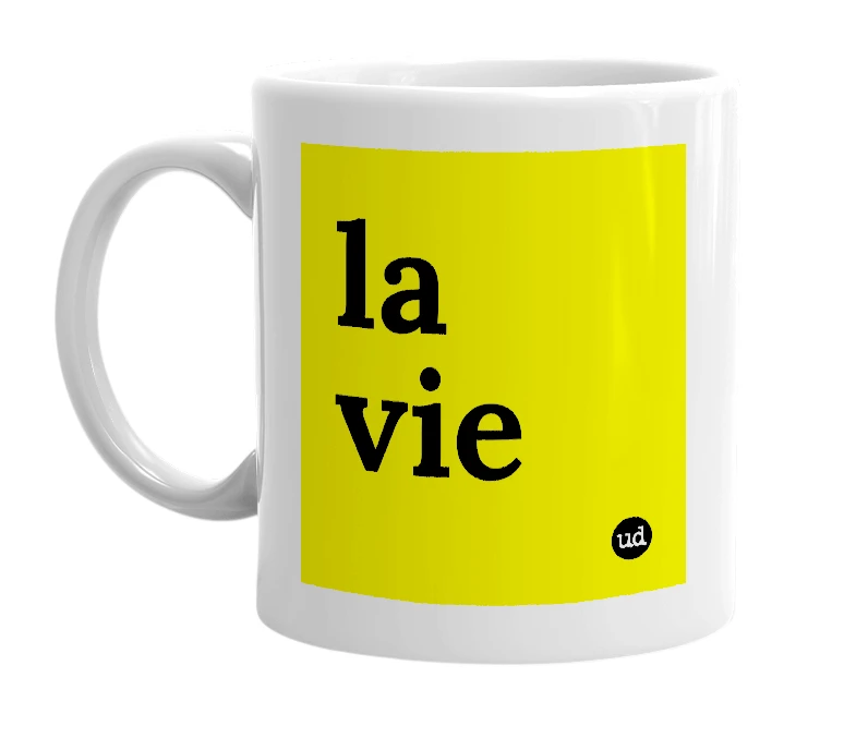 White mug with 'la vie' in bold black letters