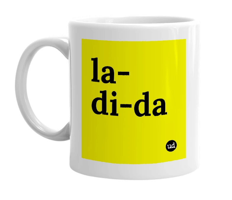 White mug with 'la-di-da' in bold black letters
