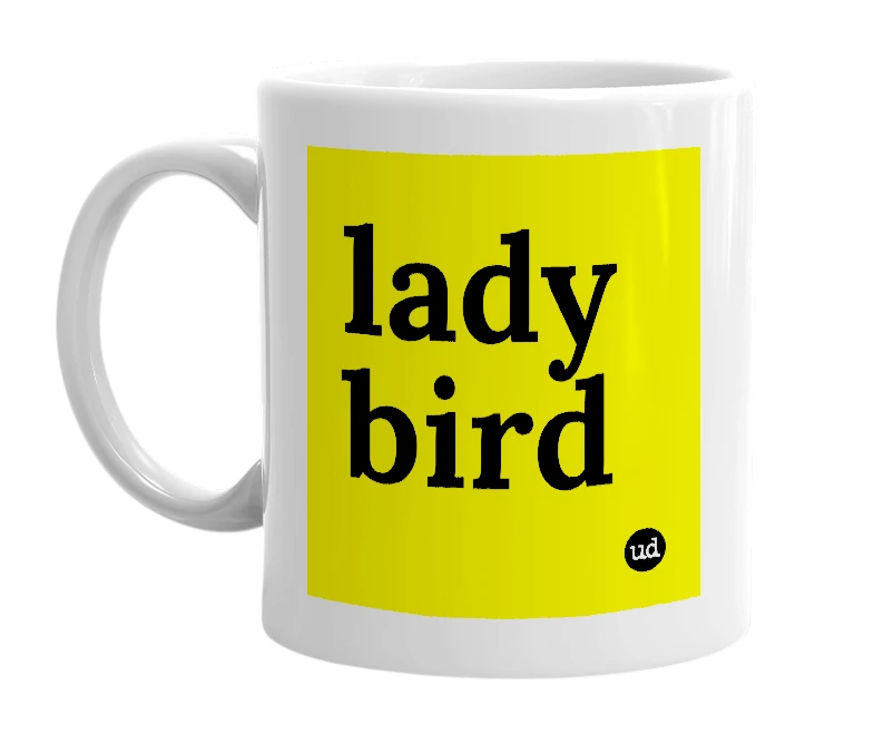 White mug with 'lady bird' in bold black letters