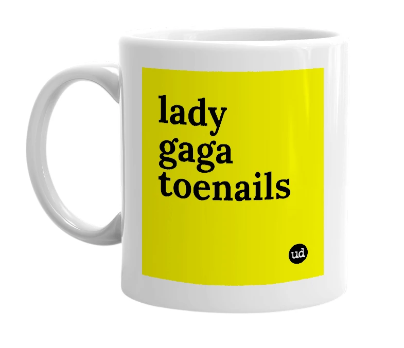 White mug with 'lady gaga toenails' in bold black letters