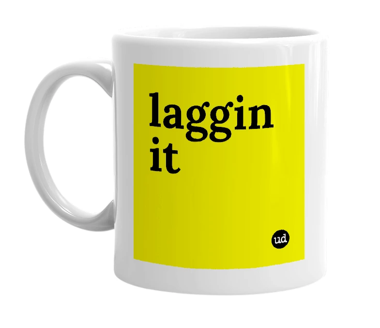 White mug with 'laggin it' in bold black letters
