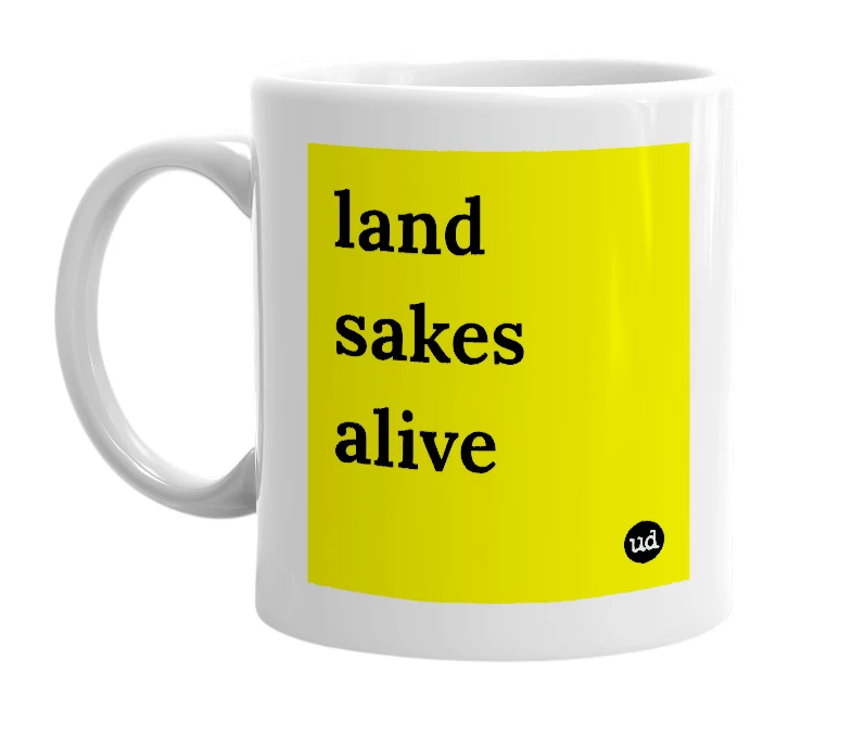 White mug with 'land sakes alive' in bold black letters