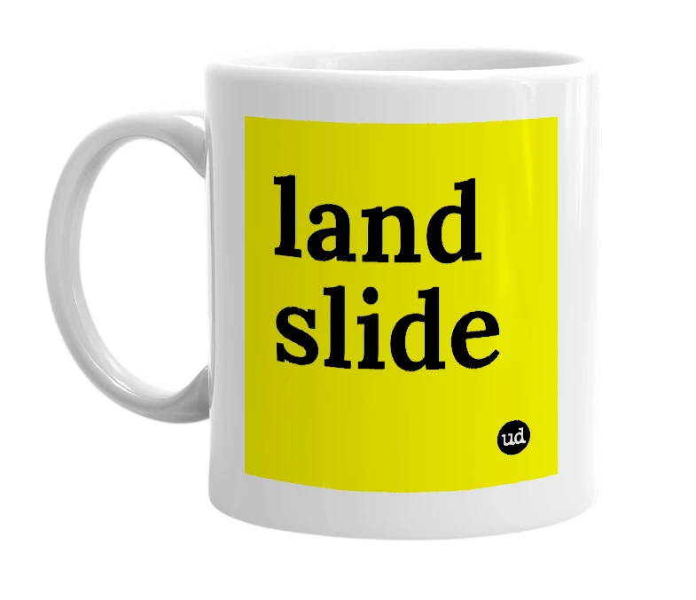 White mug with 'land slide' in bold black letters