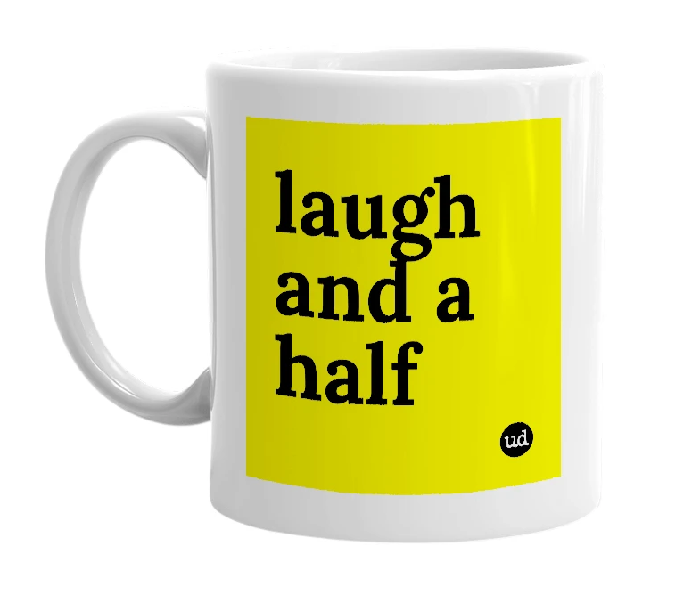 White mug with 'laugh and a half' in bold black letters