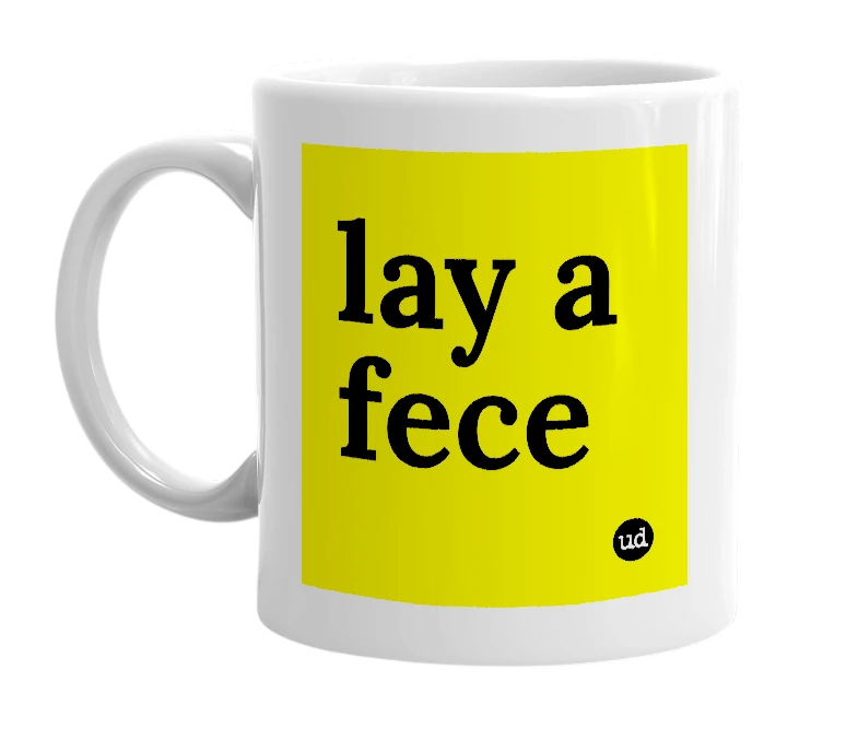 White mug with 'lay a fece' in bold black letters
