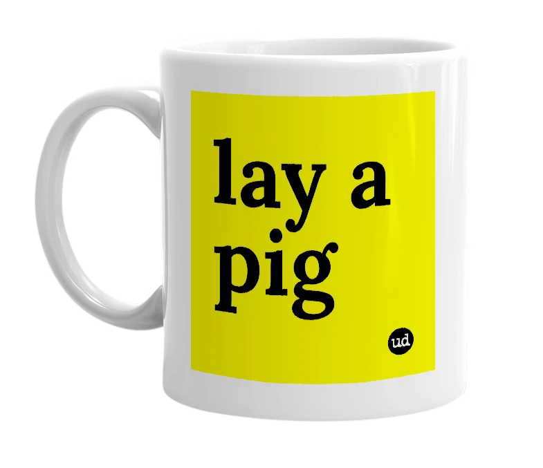 White mug with 'lay a pig' in bold black letters