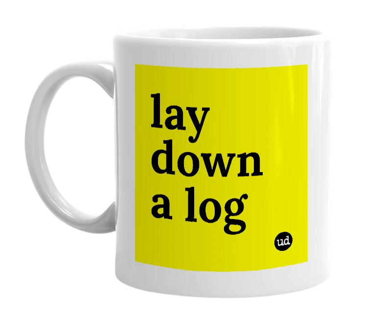 White mug with 'lay down a log' in bold black letters