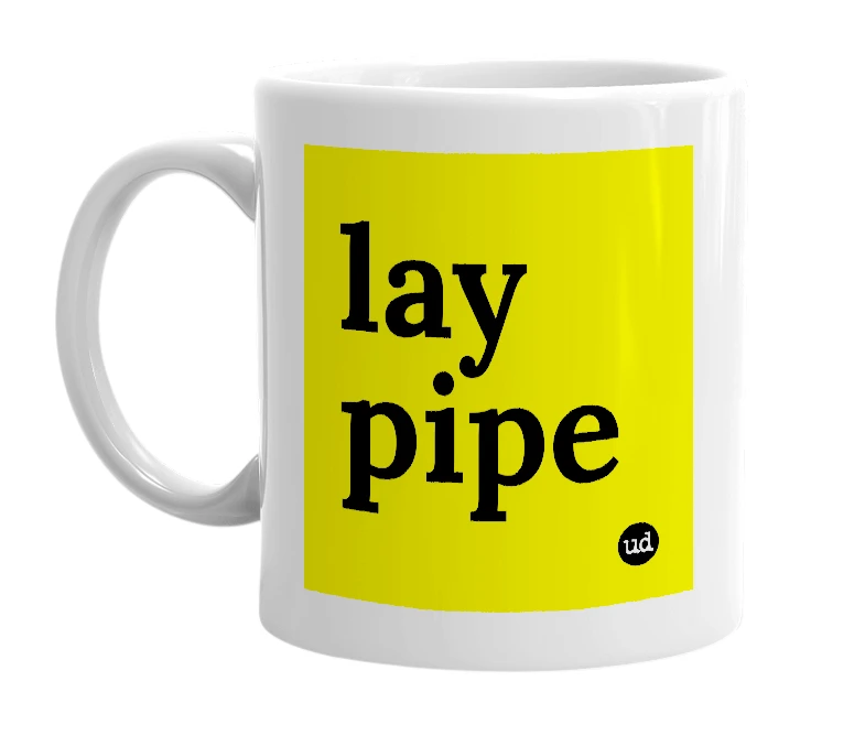 White mug with 'lay pipe' in bold black letters