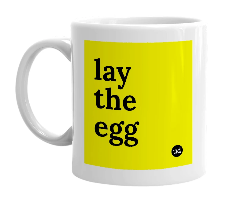 White mug with 'lay the egg' in bold black letters
