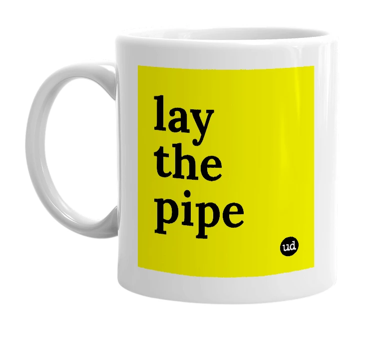 White mug with 'lay the pipe' in bold black letters