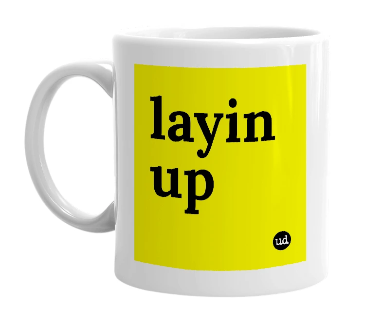 White mug with 'layin up' in bold black letters