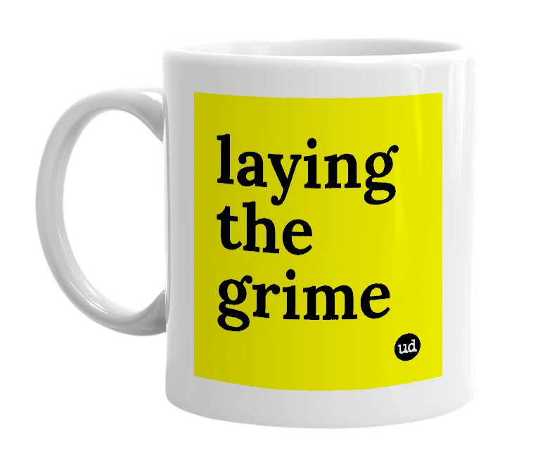 White mug with 'laying the grime' in bold black letters
