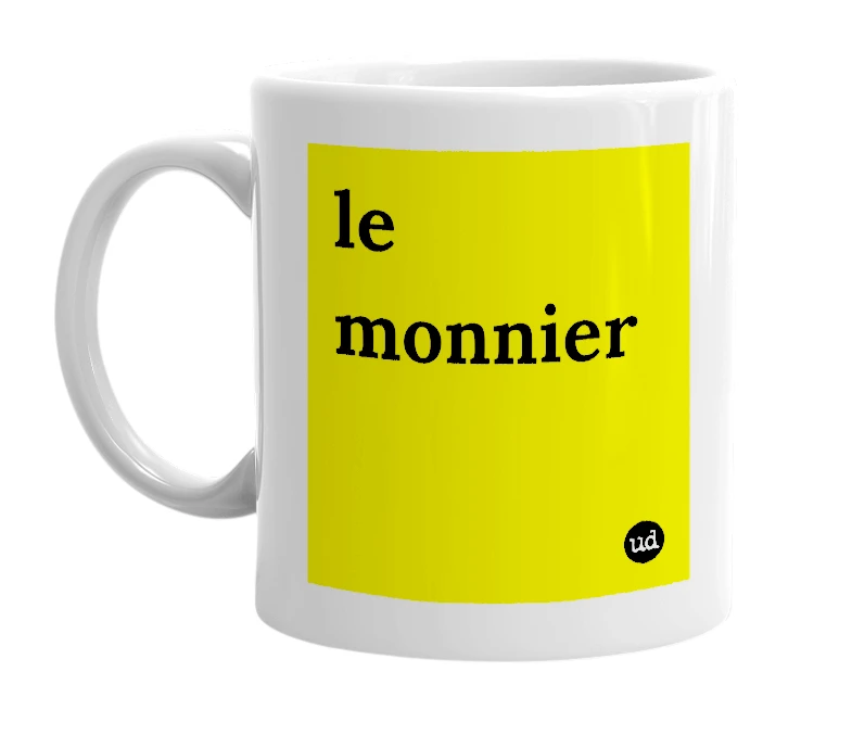 White mug with 'le monnier' in bold black letters
