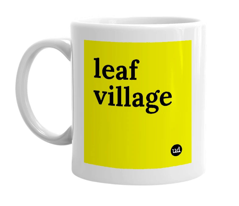 White mug with 'leaf village' in bold black letters