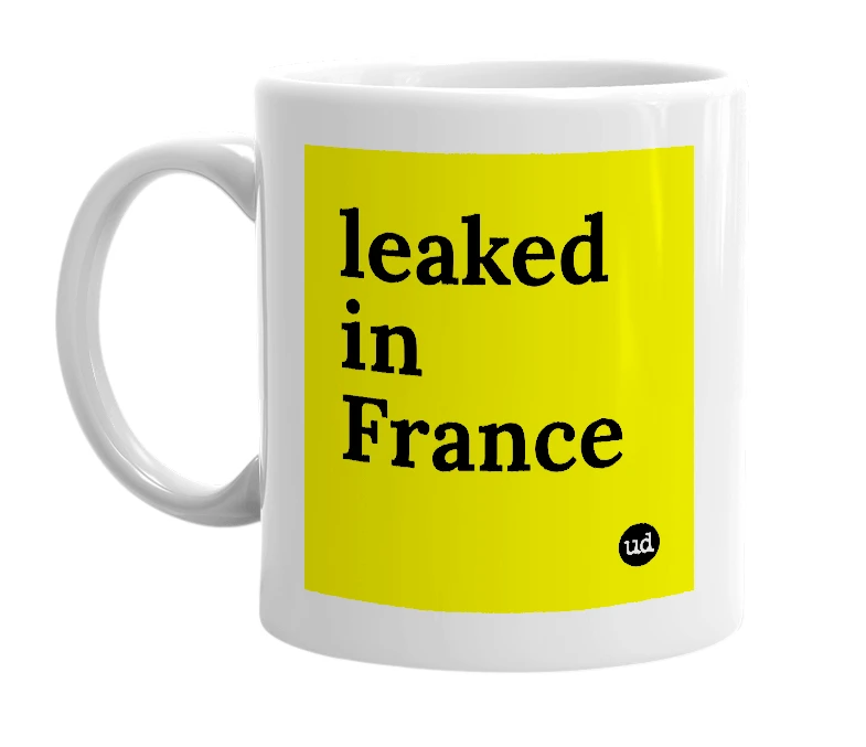 White mug with 'leaked in France' in bold black letters