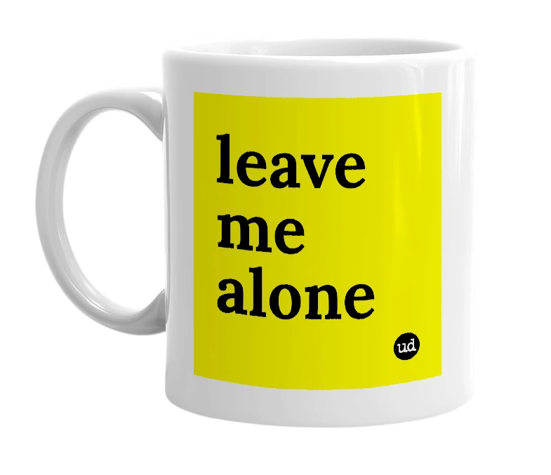 White mug with 'leave me alone' in bold black letters