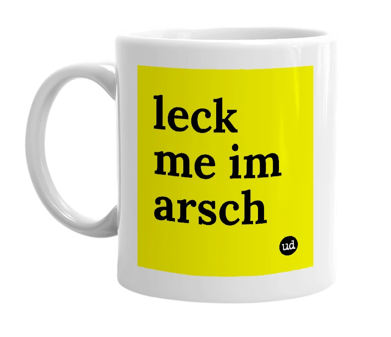 White mug with 'leck me im arsch' in bold black letters