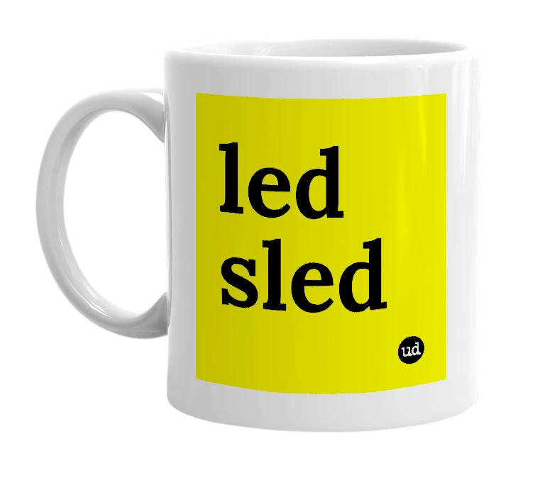 White mug with 'led sled' in bold black letters