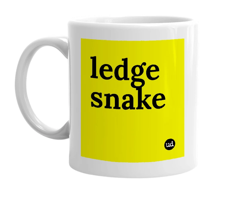White mug with 'ledge snake' in bold black letters
