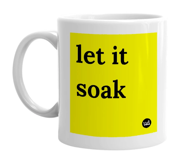 White mug with 'let it soak' in bold black letters