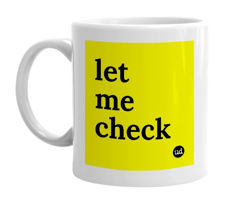 White mug with 'let me check' in bold black letters