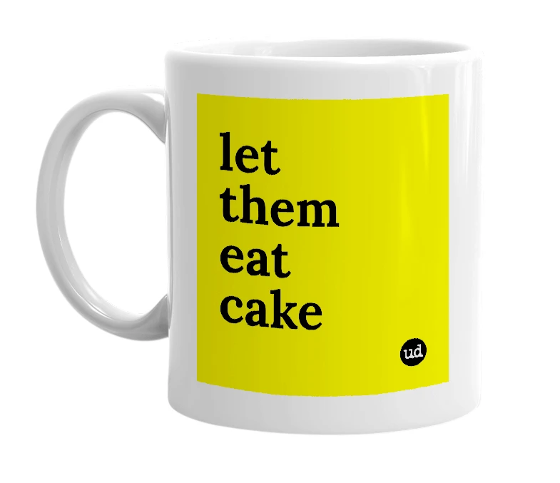 White mug with 'let them eat cake' in bold black letters