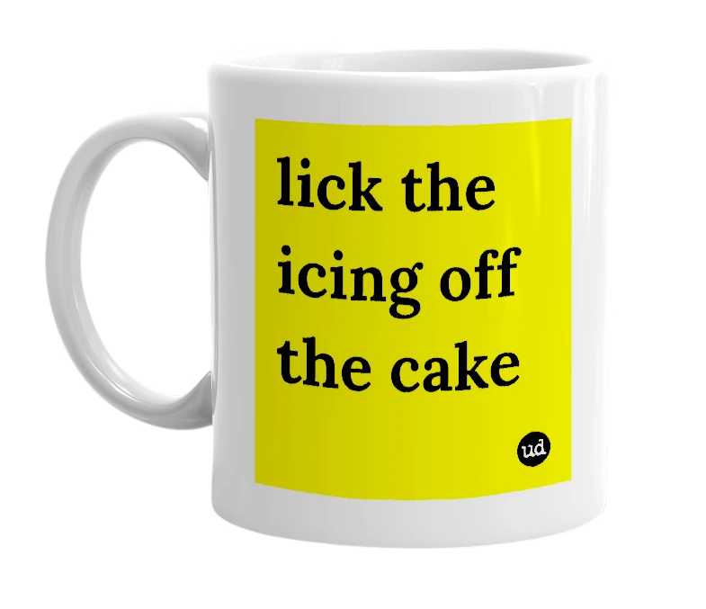 White mug with 'lick the icing off the cake' in bold black letters