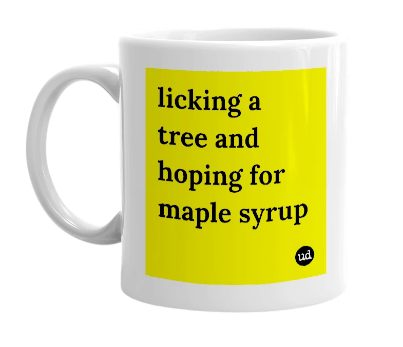 White mug with 'licking a tree and hoping for maple syrup' in bold black letters
